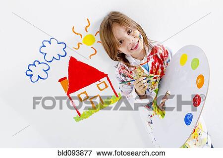 Stock Photo - Hispanic girl painting. Fotosearch