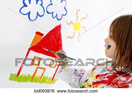 Stock Photograph - Hispanic girl painting. Fotosearch