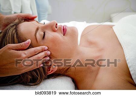 Hispanic woman having facial View Large Photo Image Stock Photo - Hispanic woman having facial. Fotosearch