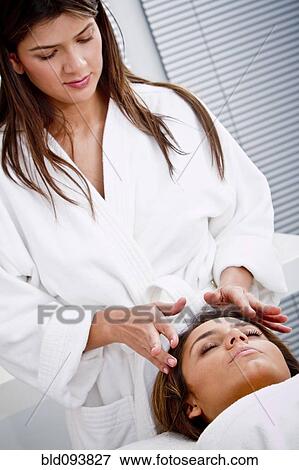 Hispanic woman having facial View Large Photo Image Stock Photo - Hispanic woman having facial. Fotosearch