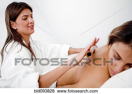 Hispanic woman having massage View Large Photo Image Stock Photo - Hispanic woman having massage. Fotosearch
