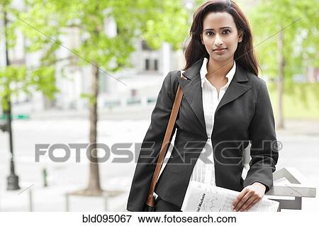 Stock Photo - Indian businesswoman standing outdoors. Fotosearch