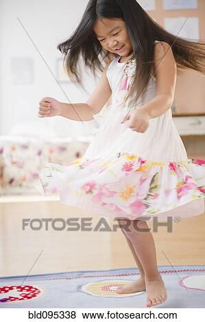 Stock Photo - Korean girl dancing. Fotosearch