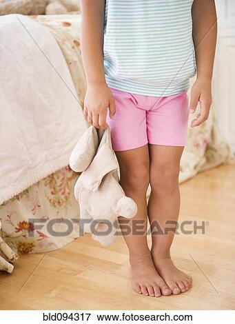 Korean girl holding stuffed animal View Large Photo Image Stock Photo - Korean girl holding stuffed animal. Fotosearch