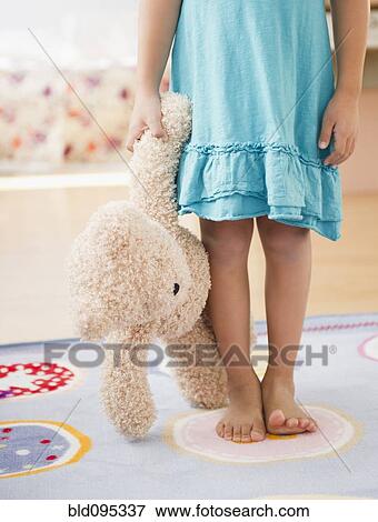 Korean girl holding teddy bear View Large Photo Image Stock Photo - Korean girl holding teddy bear. Fotosearch
