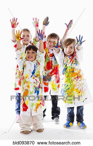 Messy Hispanic children finger painting View Large Photo Image Stock Image - Messy Hispanic children finger painting. Fotosearch