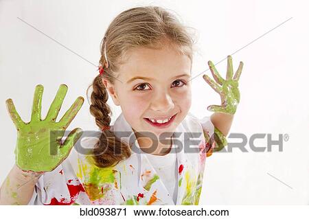 Messy Hispanic girl finger painting View Large Photo Image Stock Image - Messy Hispanic girl finger painting. Fotosearch