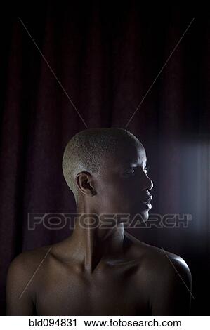Stock Image - Profile of topless Jamaican woman. Fotosearch