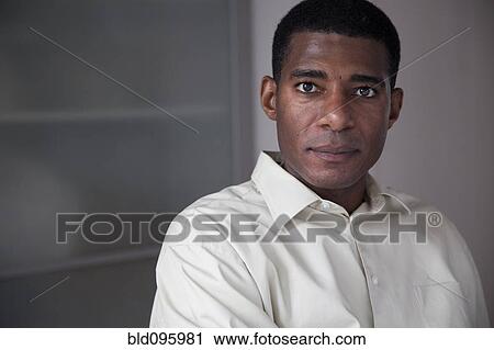 Stock Image - Serious Black businessman. Fotosearch