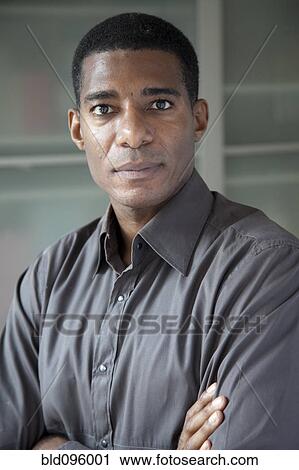 Stock Image - Serious Black businessman. Fotosearch