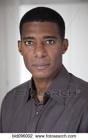 Serious Black businessman View Large Photo Image Stock Image - Serious Black businessman. Fotosearch