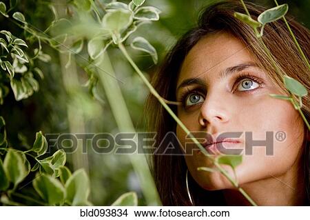 Picture - Serious Hispanic woman. Fotosearch