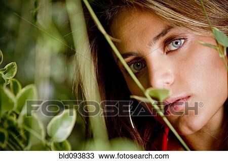 Stock Image - Serious Hispanic woman. Fotosearch