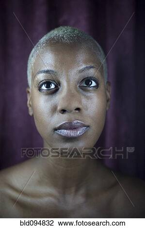 Stock Image - Serious Jamaican woman. Fotosearch