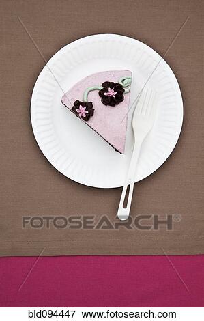 Slice of birthday cake on paper plate View Large Photo Image Stock Photo - Slice of birthday cake on paper plate. Fotosearch