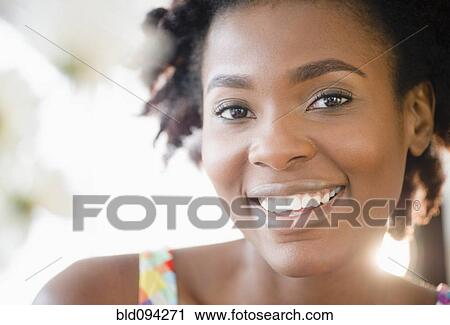 Stock Image - Smiling Black woman. Fotosearch