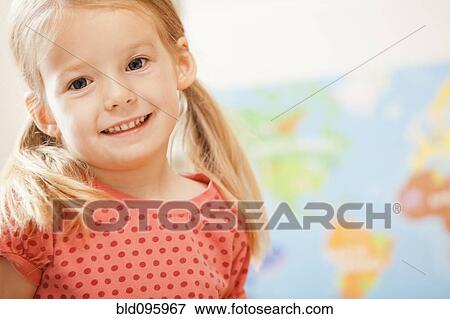 Stock Photo - Smiling Caucasian girl. Fotosearch