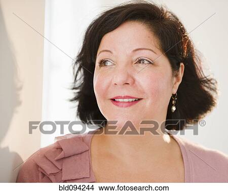 Picture - Smiling Hispanic woman. Fotosearch