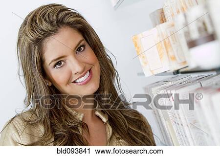Stock Image - Smiling Hispanic woman. Fotosearch