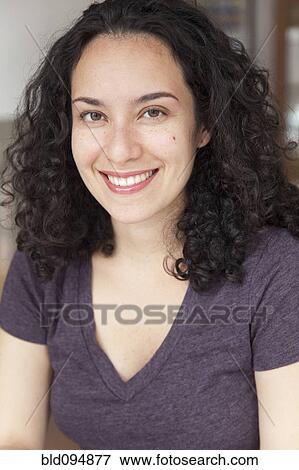 Stock Photo - Smiling Hispanic woman. Fotosearch