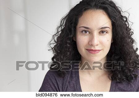 Stock Photograph - Smiling Hispanic woman. Fotosearch