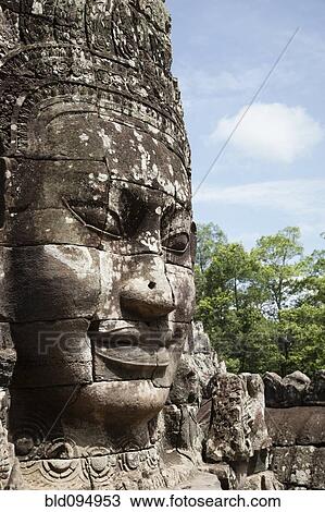 Stock Image - Stone face in Avalokiteshvara, Bayon Temple. Fotosearch