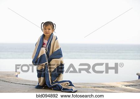 Wet Hispanic girl wrapped in a towel View Large Photo Image Stock Image - Wet Hispanic girl wrapped in a towel. Fotosearch