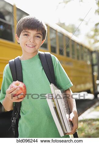 Caucasian boy waiting for school bus View Large Photo Image Picture - Caucasian boy waiting for school bus. Fotosearch