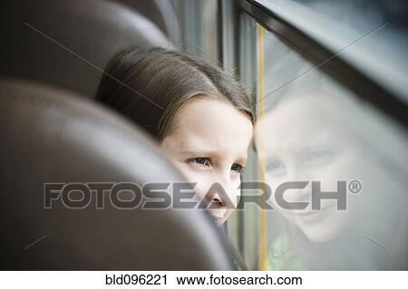 Caucasian girl riding school bus View Large Photo Image Stock Image - Caucasian girl riding school bus. Fotosearch
