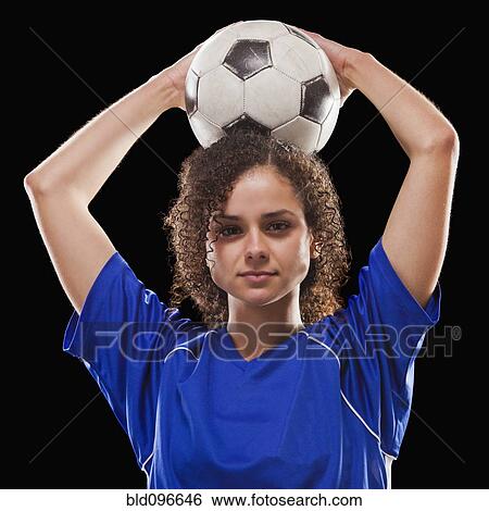 Caucasian soccer player holding ball View Large Photo Image Stock Photograph - Caucasian soccer player holding ball. Fotosearch