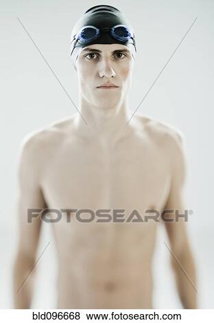 Caucasian teenage boy in swim cap and goggles View Large Photo Image Stock Photo - Caucasian teenage boy in swim cap and goggles. Fotosearch