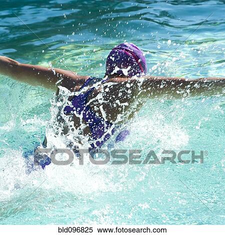 Caucasian teenager swimming in swimming pool View Large Photo Image Stock Photography - Caucasian teenager swimming in swimming pool. Fotosearch