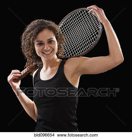 Caucasian tennis player holding tennis racket View Large Photo Image Picture - Caucasian tennis player holding tennis racket. Fotosearch