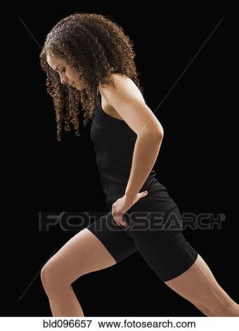 Stock Photo - Caucasian woman exercising. Fotosearch