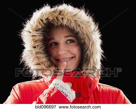 Caucasian woman wearing fur-hooded coat View Large Photo Image Stock Photo - Caucasian woman wearing fur-hooded coat. Fotosearch