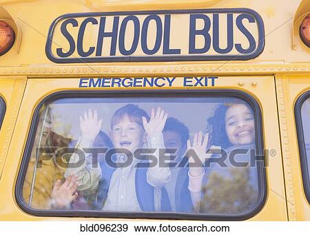 Stock Photo - Children riding school bus. Fotosearch