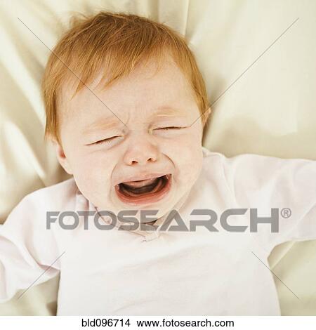 Picture - Crying Caucasian baby girl. Fotosearch