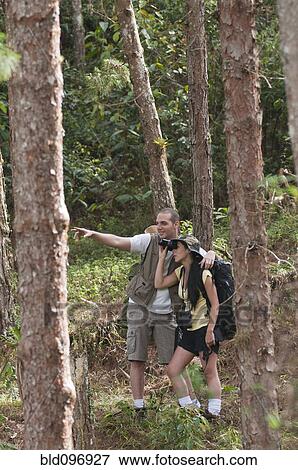 Stock Photo - Hispanic couple hiking together. Fotosearch