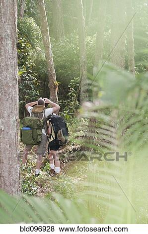 Stock Photo - Hispanic couple hiking together. Fotosearch