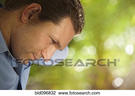 Stock Image - Serious Caucasian man. Fotosearch