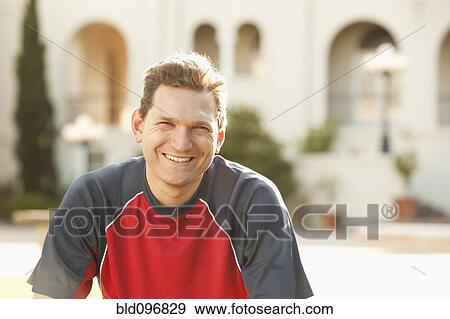 Stock Photo - Smiling Caucasian man. Fotosearch