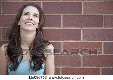 Stock Image - Smiling Caucasian woman. Fotosearch