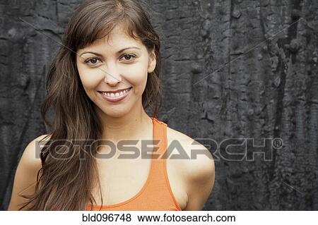 Smiling mixed race woman View Large Photo Image Stock Photo - Smiling mixed race woman. Fotosearch