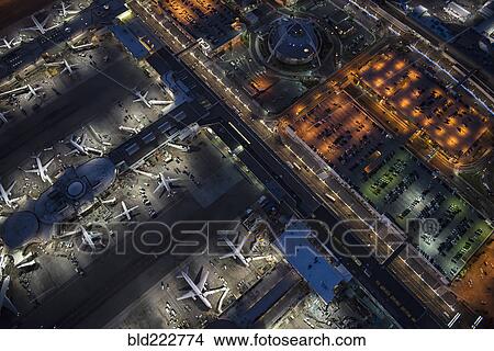 Picture - Aerial view of airplanes parked in airport gates. Fotosearch