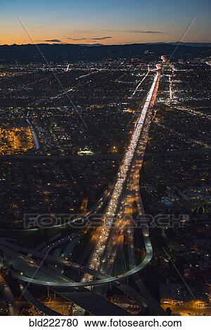 Stock Image - "Aerial view of highway in Los Angeles cityscape, California, United States". Fotosearch