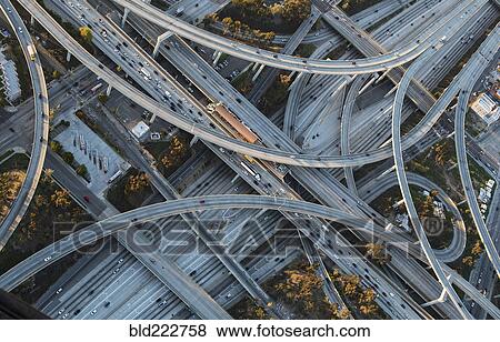 Stock Photo - Aerial view of highway interchange in cityscape. Fotosearch