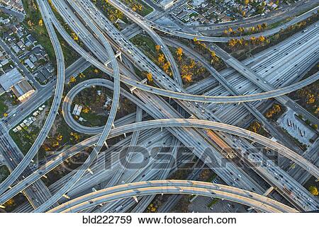 Stock Photo - Aerial view of highway interchange in cityscape. Fotosearch