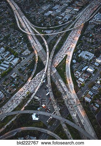 Stock Photo - Aerial view of highway interchange in cityscape. Fotosearch
