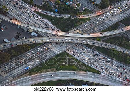 Stock Photo - Aerial view of highway interchange in cityscape. Fotosearch