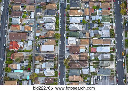 Stock Photography - Aerial view of houses in suburban cityscape. Fotosearch
